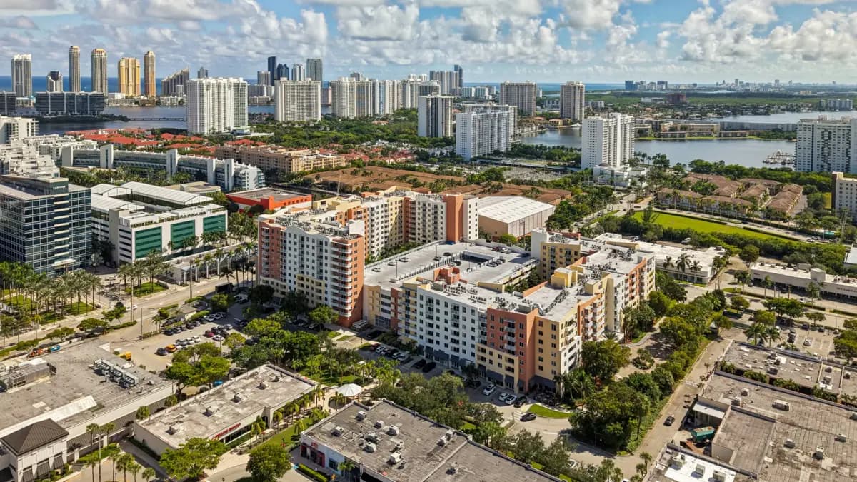Aerial view of The Venture at Aventura with Sunny Isles and the Atlantic in the distance